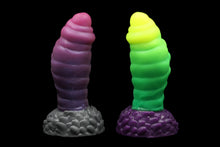 Load image into Gallery viewer, Photo of two Lux the Mothman silicone sex toys from Lycantasy, showcasing both signature colors, Blood Moon and Firefly