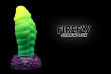 Load image into Gallery viewer, Lux the Mothman silicone dildo from Lycantasy.com - photo showcasing the Firefly signature coloration, with a yellow tip faded to an emerald green shaft, and split to a purple base!