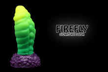 Load image into Gallery viewer, Lux the Mothman silicone dildo from Lycantasy.com - photo showcasing the Firefly signature coloration, with a yellow tip faded to an emerald green shaft, and split to a purple base!
